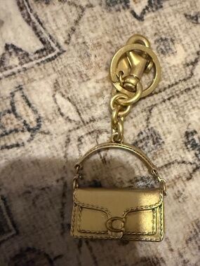 COACH brass purse keychain